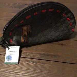 African lily Tembo King NWT leather zippered bag